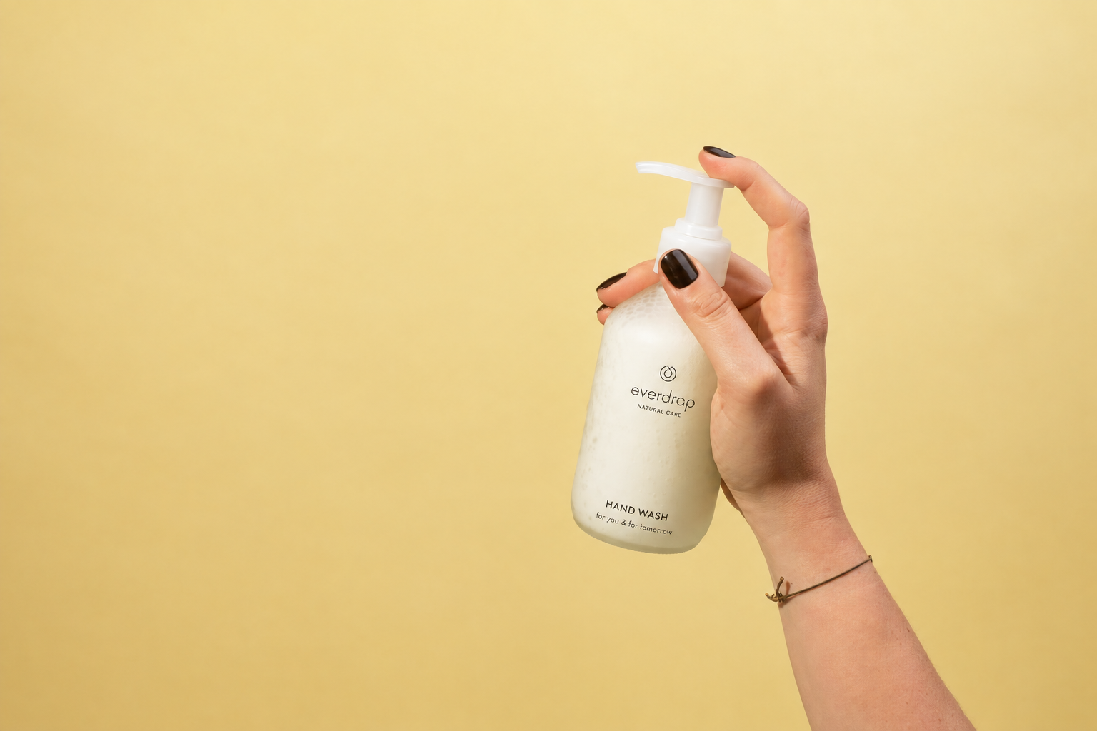 Body care product on a warm yellow background
